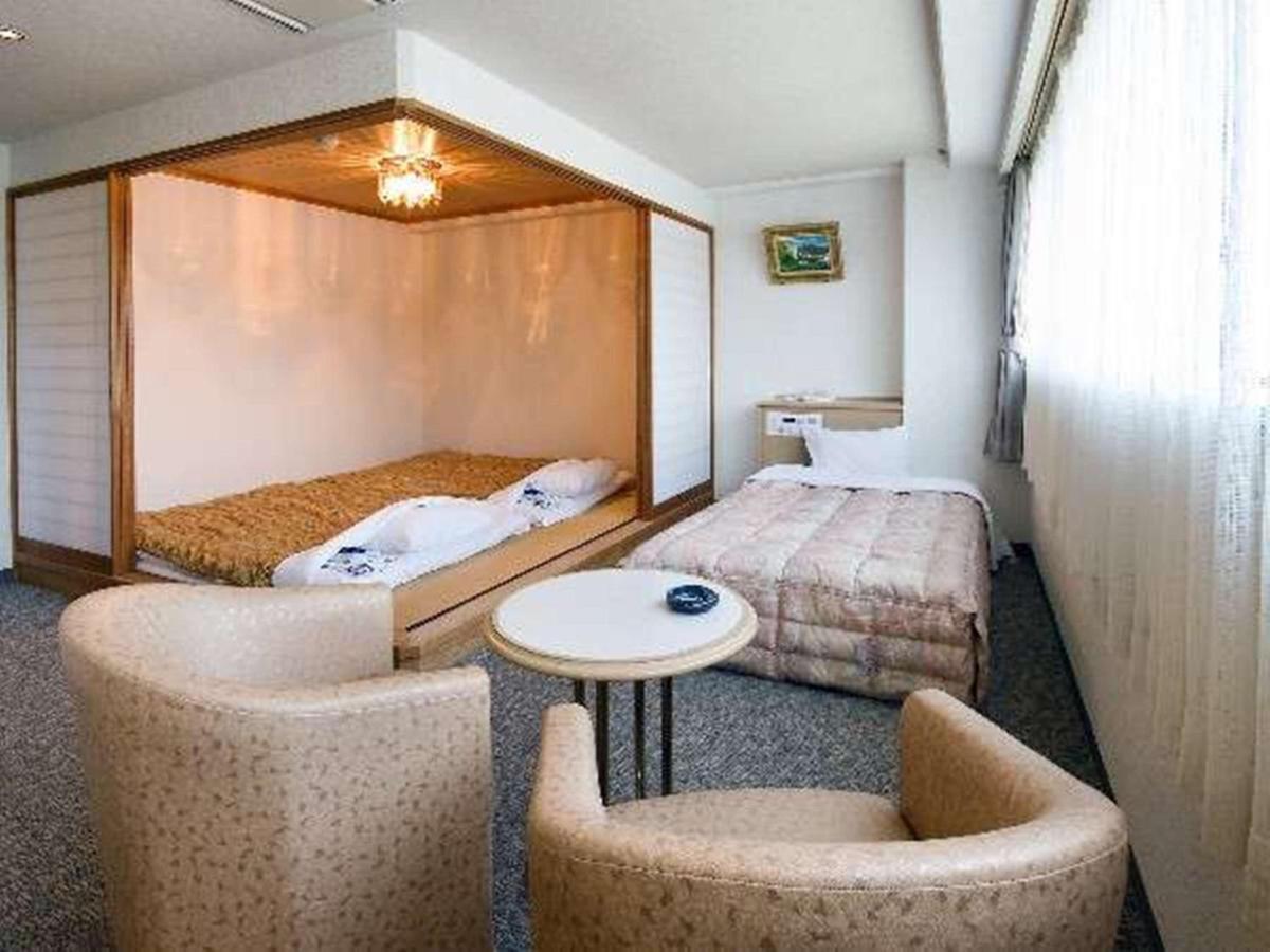 Hotel Taihei Мацуяма Экстерьер фото